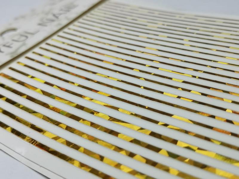 Sticker lineas Holografico Dorado